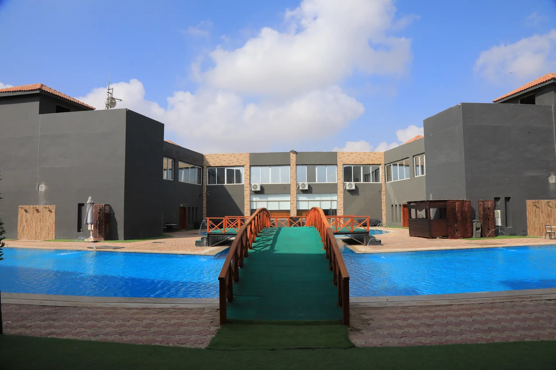 Luxury desert resort panoramic view at sunset, BYOOT BAY, Cairo–Alexandria Desert Road